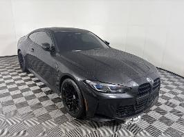 2023 BMW M4 with Black Sapphire Metallic Exterior