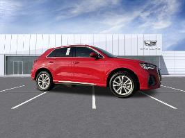 2025 Audi Q3 with Progressive Red Metallic Exterior
