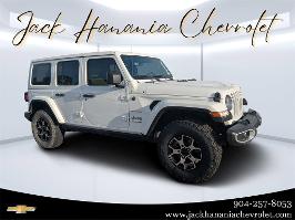 2018 Jeep Wrangler Unlimited with Bright White Clearcoat Exterior