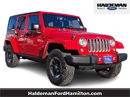 2017 Jeep Wrangler Unlimited with Firecracker Red Clearcoat Exterior