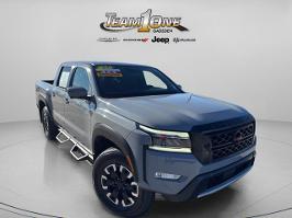 2023 Nissan Frontier with Boulder Gray Pearl Exterior