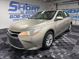 2015 Toyota Camry with Creme Brulee Mica Exterior