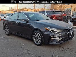 2019 Kia Optima with Platinum Graphite Exterior