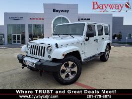 2017 Jeep Wrangler Unlimited with Bright White Clearcoat Exterior