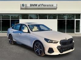 2026 BMW 5 Series with Mineral White Metallic Exterior