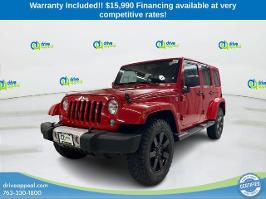 2014 Jeep Wrangler Unlimited with Flame Red Clearcoat Exterior